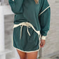 Evergreen Color Contrast Loose Pullover and Lace-up Waist Skort Set