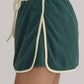 Evergreen Color Contrast Loose Pullover and Lace-up Waist Skort Set