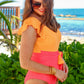 Vitality Orange Color Block Ruffled Knotted Backless One Piece Swimsuit