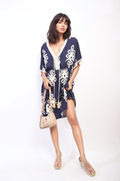 Printed V-Neck Short Sleeve Midi Dress with Tassel Detail - BB Fashion Outlet