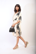 Printed V-Neck Short Sleeve Midi Dress with Tassel Detail - BB Fashion Outlet