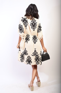 Printed V-Neck Short Sleeve Midi Dress with Tassel Detail - BB Fashion Outlet